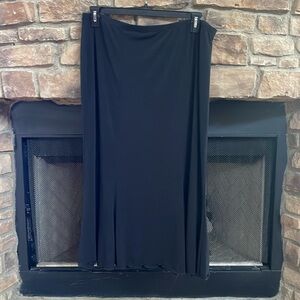 Skirtology black skirt with elastic band and ruffles on the bottom. Size XL